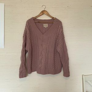 Women’s dusty pink sweater.